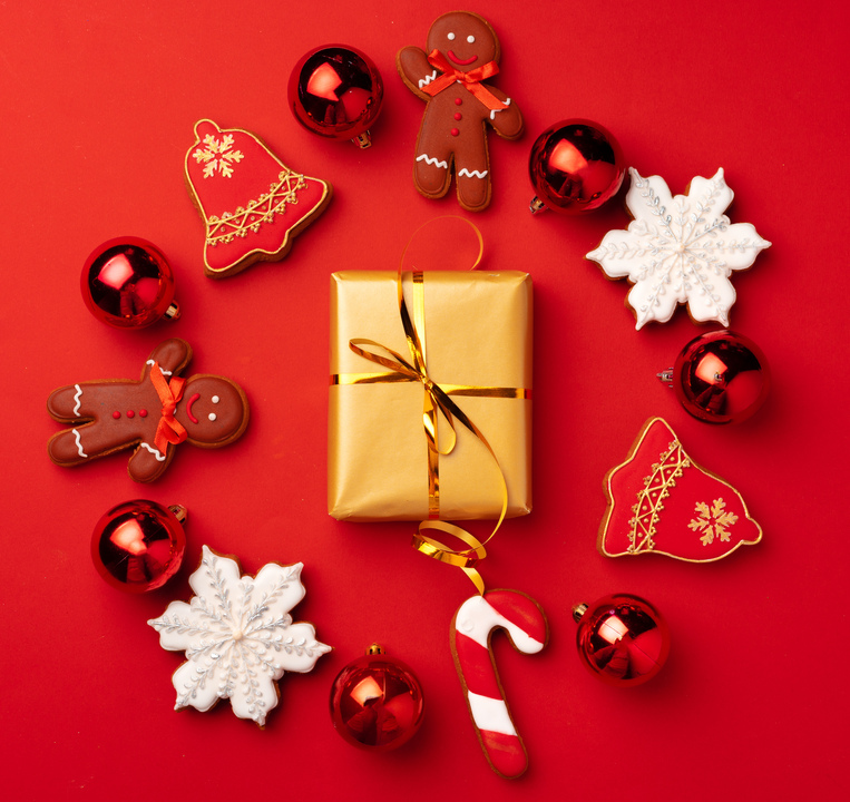 New Year background with festive decorations and gingerbread cookies